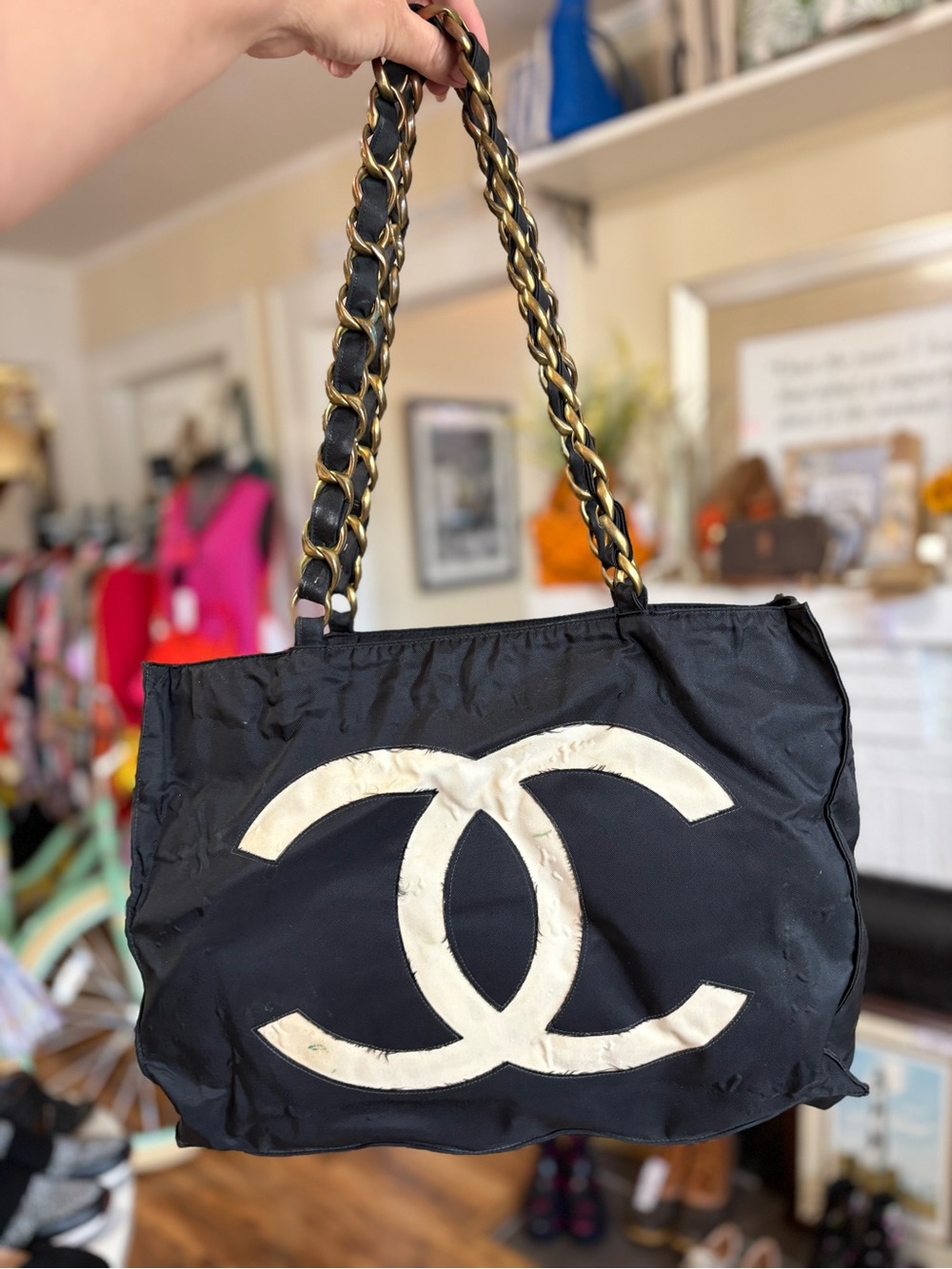 CHANEL Black Shoulder Bag with Cream CC Logo and Gold-Trim Chain Straps